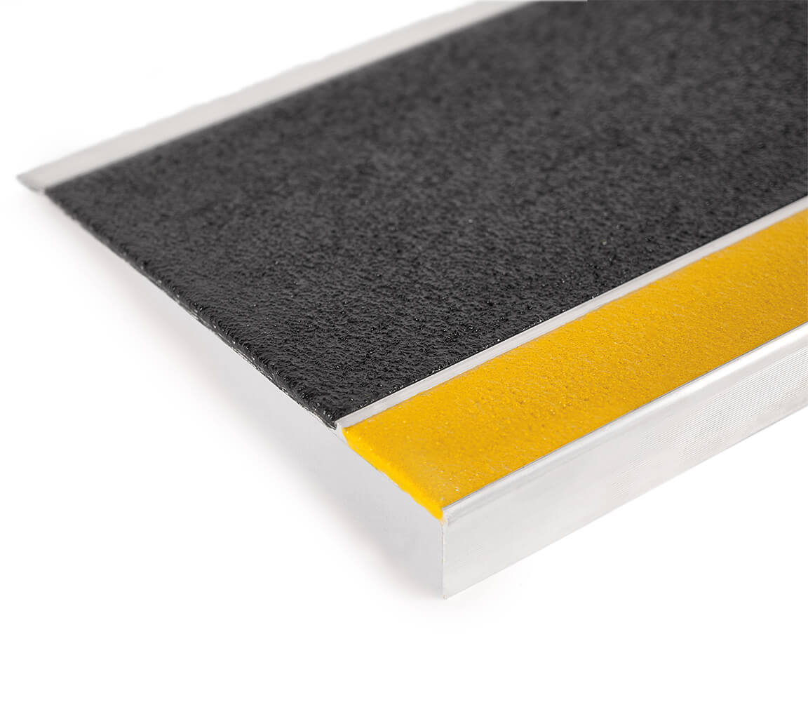 Aluminum Stair Tread with yellow safety grit surface - Sure Foot manufacturer close-up