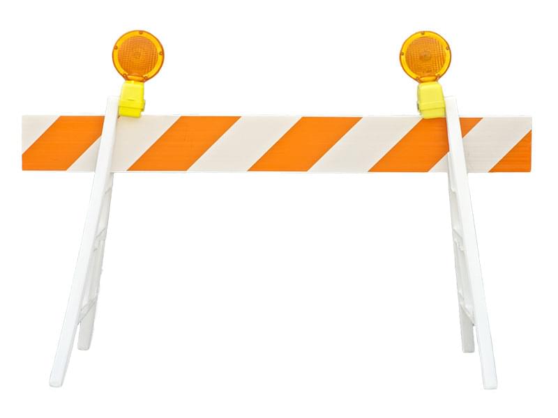 10ft Economy Barrier Rail installed with A-Frame legs and barricade lights on road