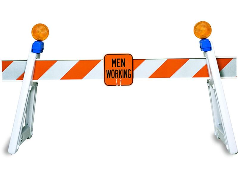 I-Beam Barrier Rail Sign Clip installed with sign on A-Frame barricade