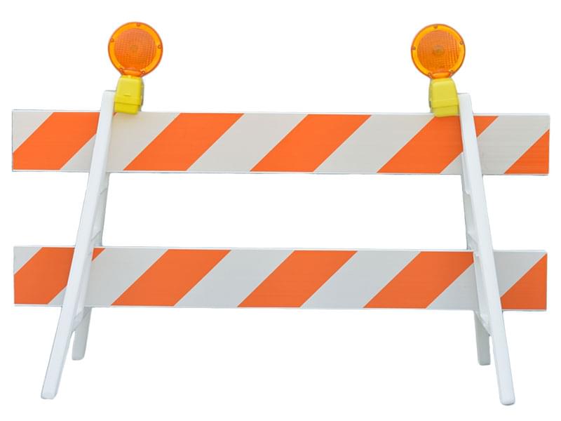 10ft I-Beam Barrier Rail with A-Frame legs and warning lights installed on road