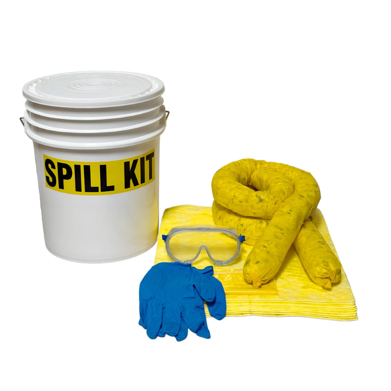 Spill kit with a white bucket, yellow absorbent pads, blue gloves, and safety goggles on a white background.