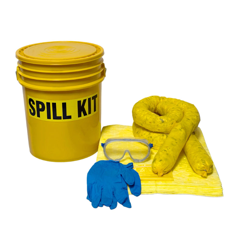 Spill kit with yellow bucket, absorbent pads, gloves, and goggles on a white background